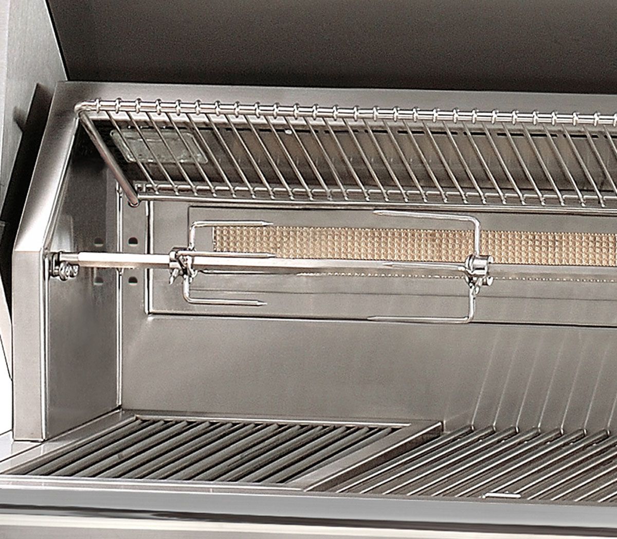 Close-up of two control knobs on a stainless steel grill with metallic finish